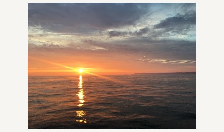 Cruising through Alderney Race at Sunset 